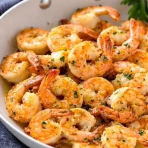 Delicious garlic butter shrimp sautéed in a rich lemon sauce, ready to serve.