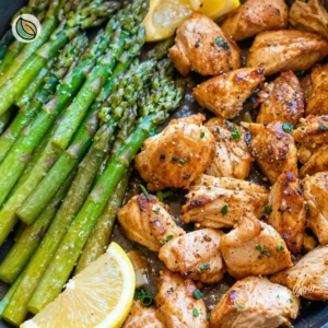 Delicious Garlic Butter Chicken served with fresh asparagus