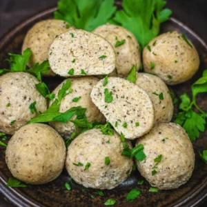 Low carb dumpling filling ingredients including ground pork, cabbage, ginger, and sesame oil.